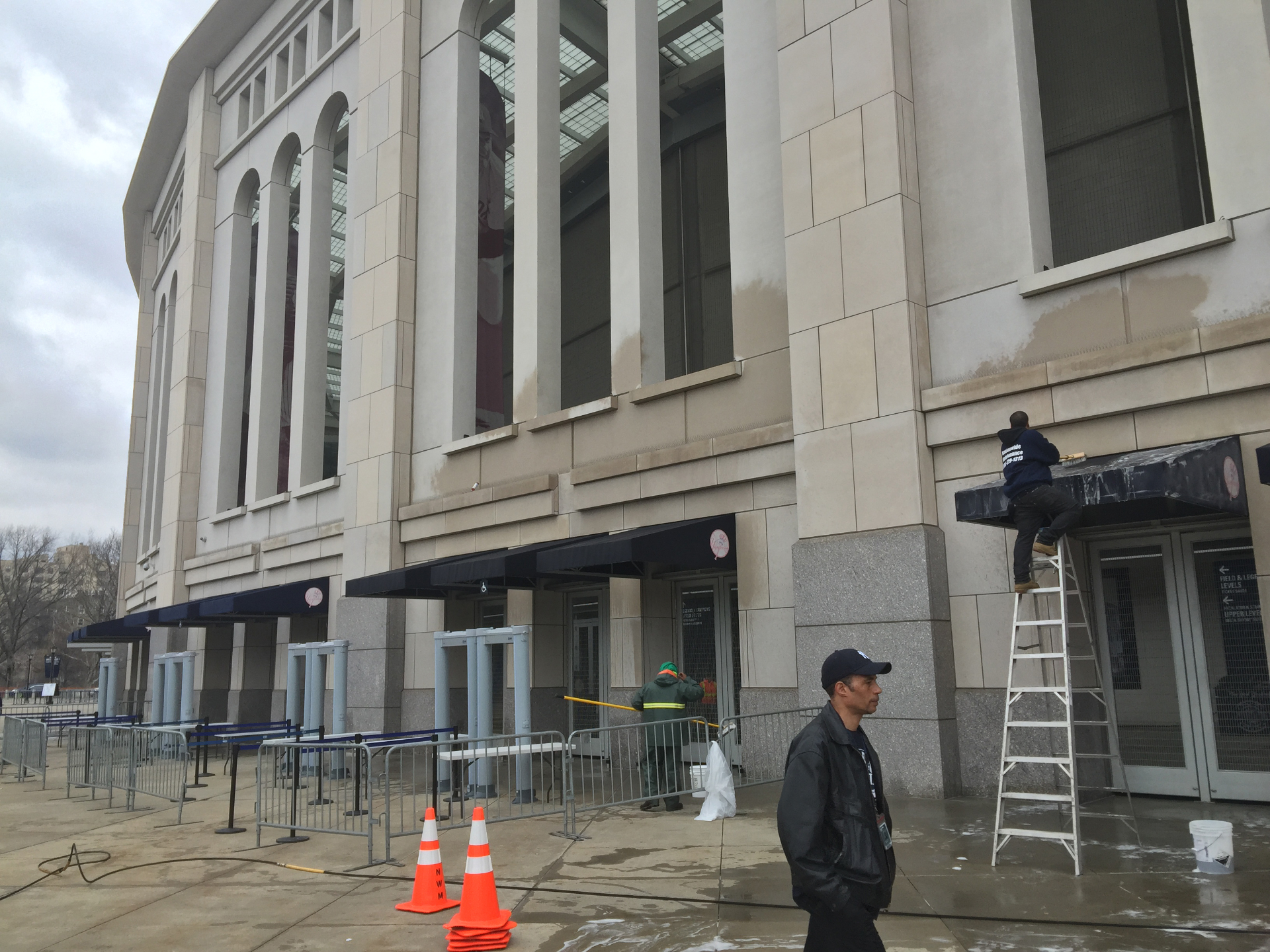 Nationwide Maintenance crew painting awnings at Yankee Stadium