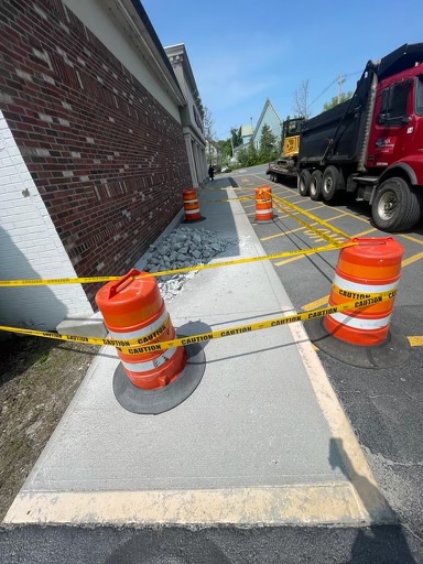 Fresh concrete sidewalk pour