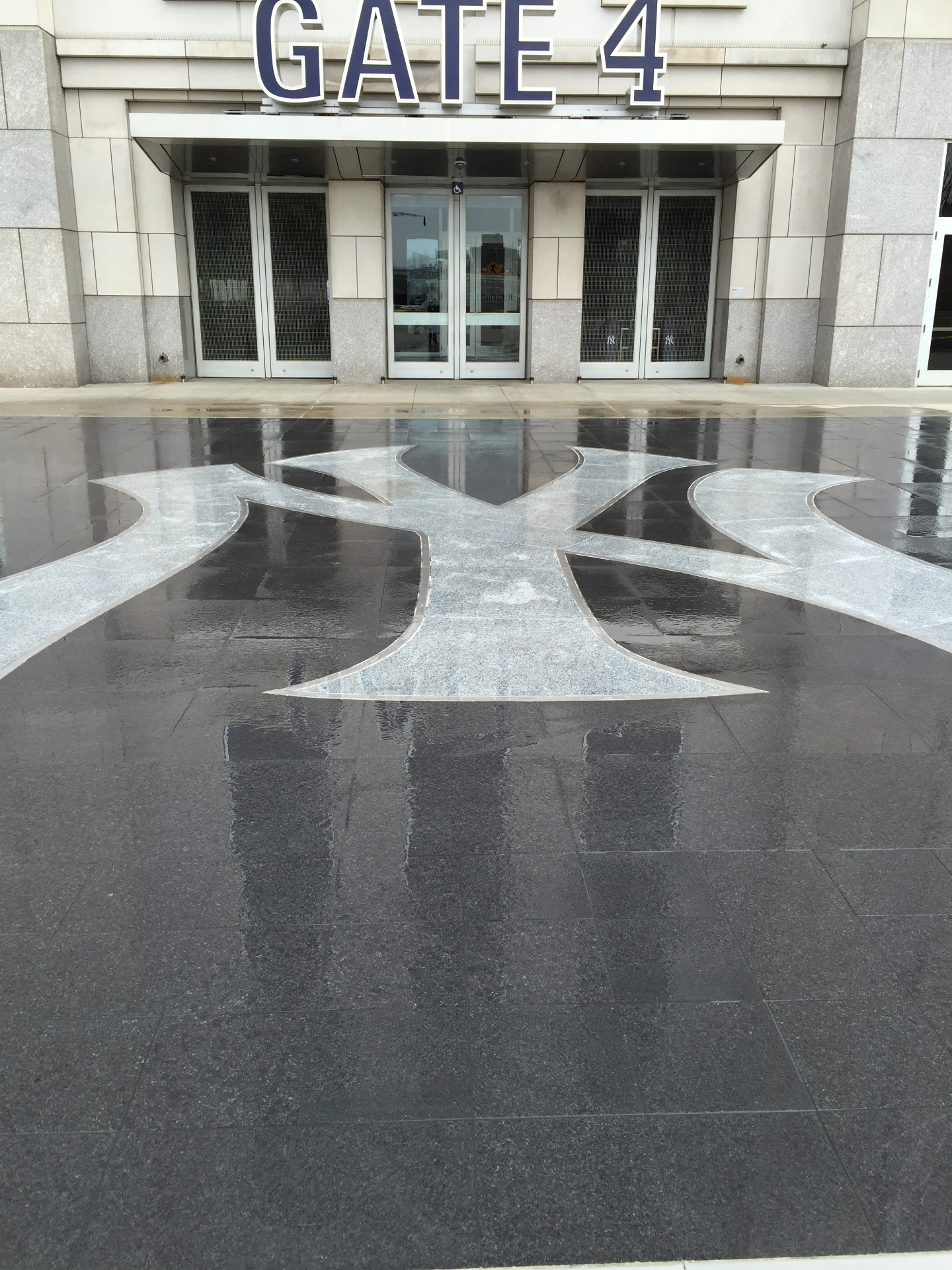 Gate 4 entrance with Yankees logo stonework