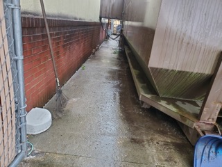 Commercial alley cleaned by pressure washing