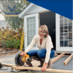 Owner, Marcie Manfredonia, preparing wood for a remodeling project