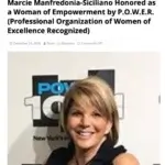 A smiling woman with short blond hair poses in front of a POWER sign. The headline above announces her being honored as a Woman of Empowerment by P.O.W.E.R. (Professional Organization of Women of Excellence Recognized).