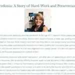 A website article titled Marcie Manfredonia: A Story of Hard-Work and Perseverance in Bedford features a portrait of a smiling woman with short blond hair above biographical text detailing her life and achievements.